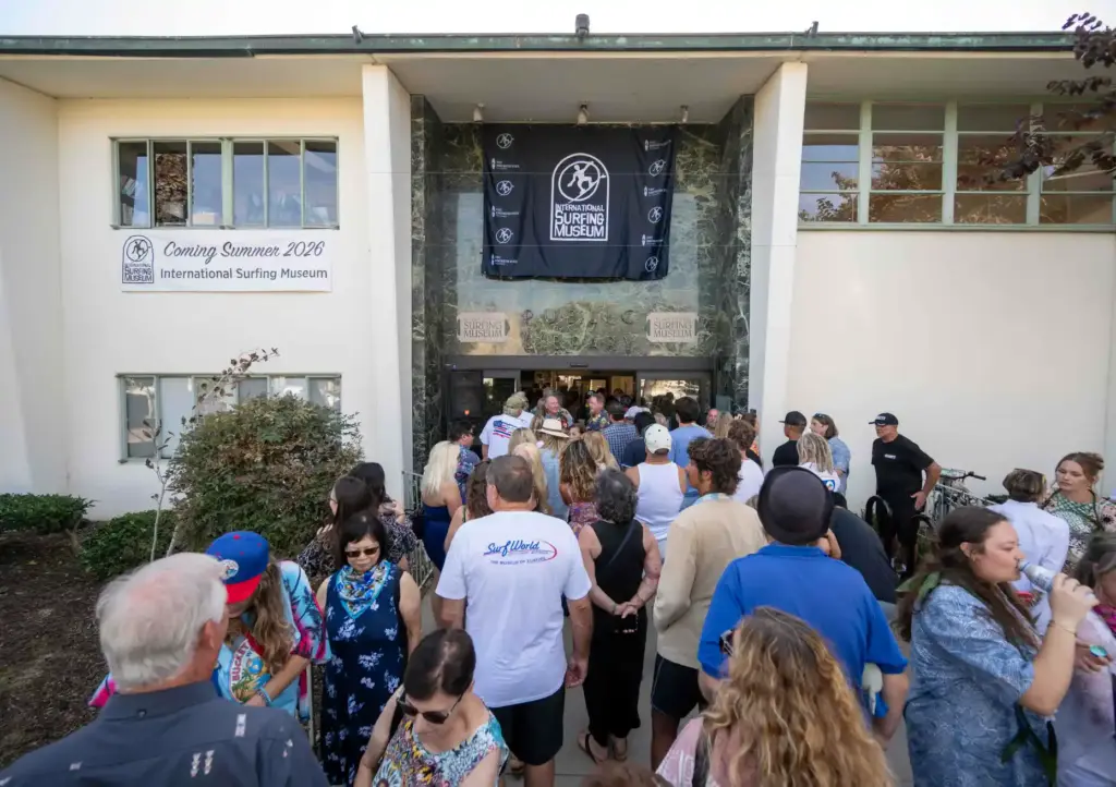 Hundreds file into the front door of the Huntington Beach...