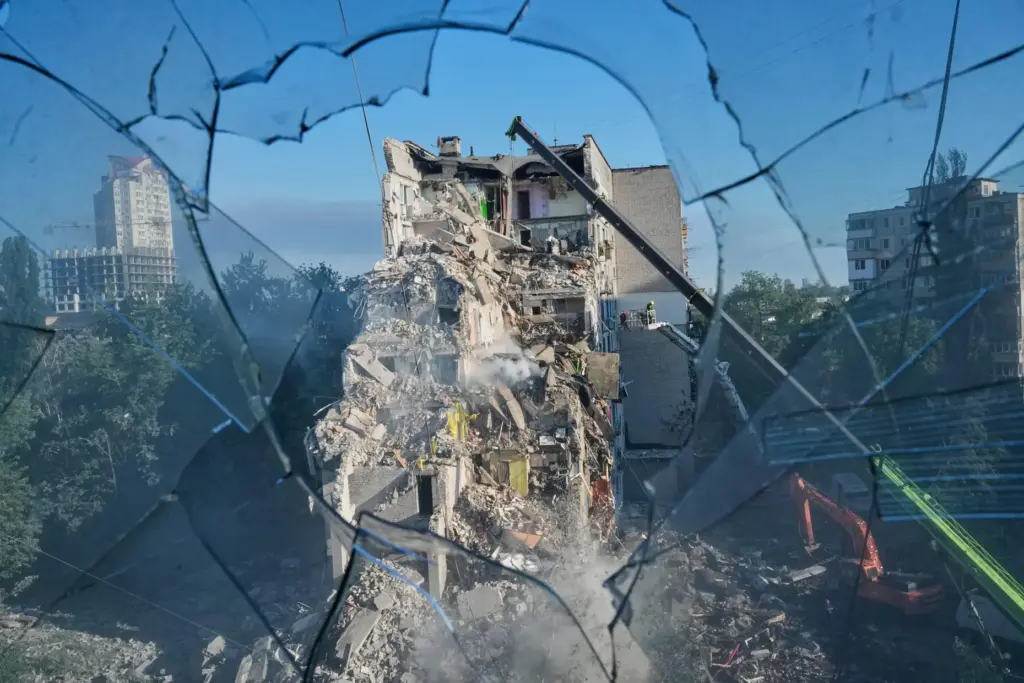 A residential apartment building is seen damaged after a Russian strike on Kyiv.