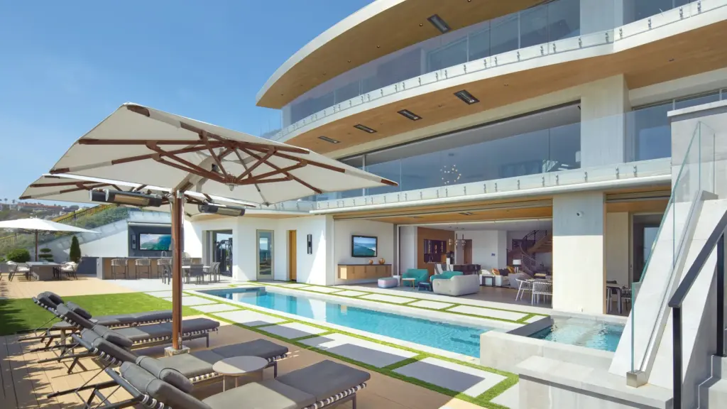 This custom-built Dana Point residence in The Strand at Headlands...