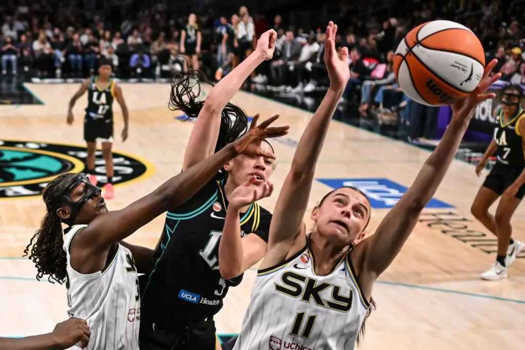 Chicago Sky rookie Gabriela Jaquez, right, gets in front of...