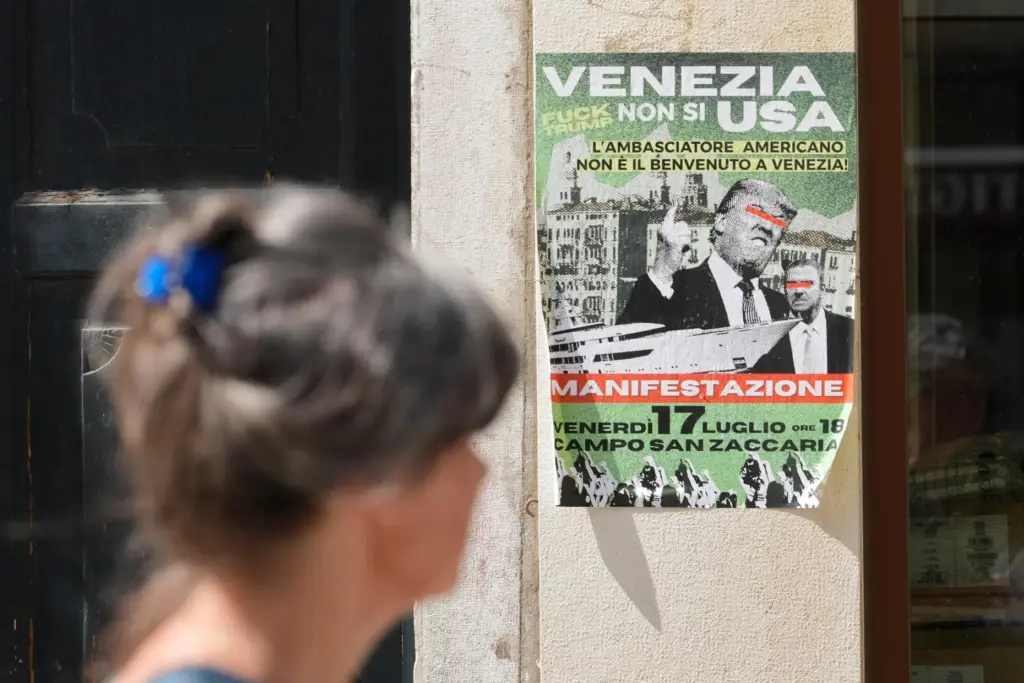 A poster of the protest against U.S. Ambassador Tilman Fertitta’s...