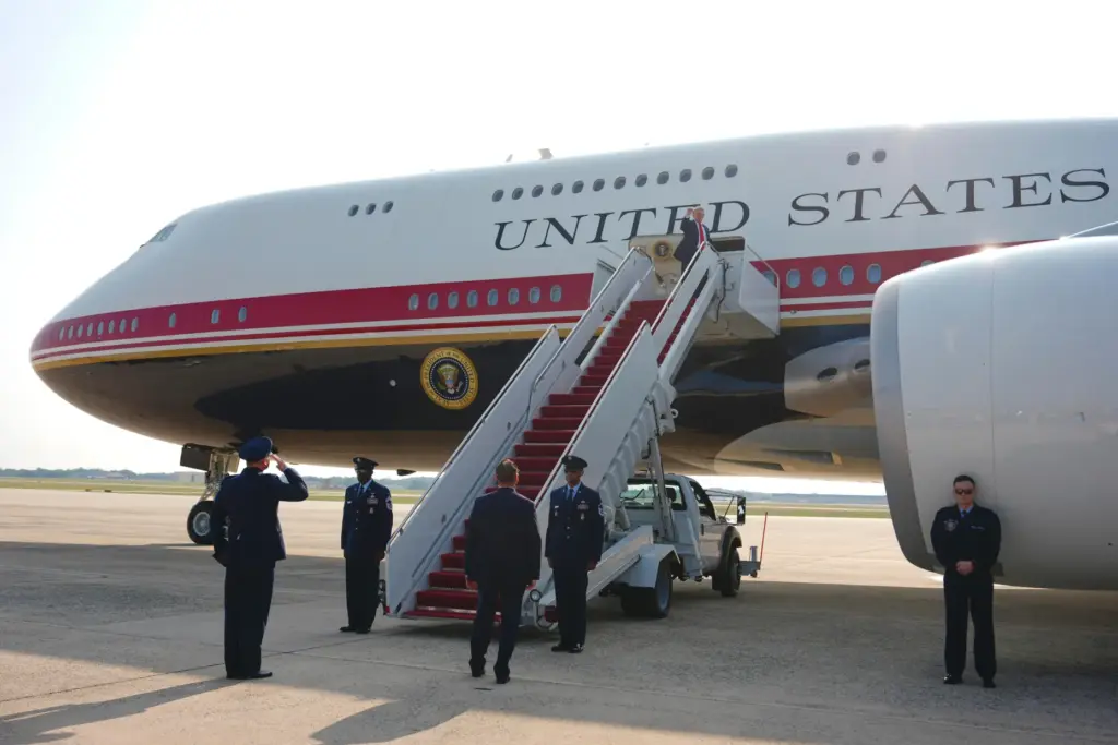 President Donald Trump boards Air Force One.