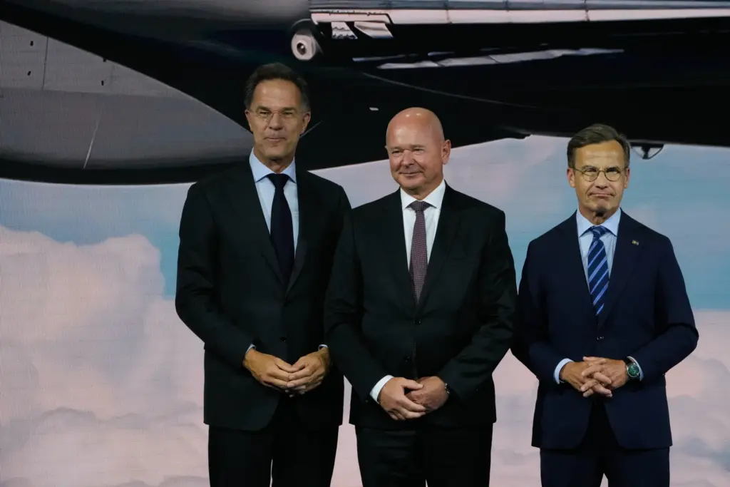 NATO Secretary General Mark Rutte, Saab CEO Micael Johansson and Sweden's Prime Minister Ulf Kristersson.