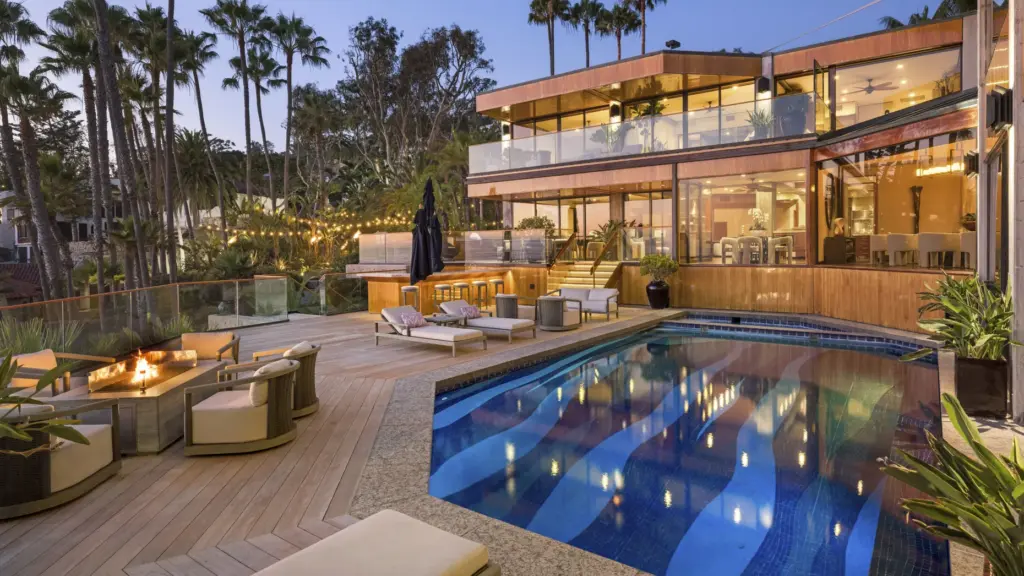 A poolside look at the ultra-luxury Laguna Beach compound that...