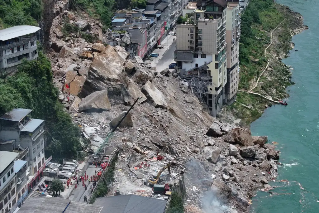 In this photo released by Xinhua News Agency, rescuers conduct...