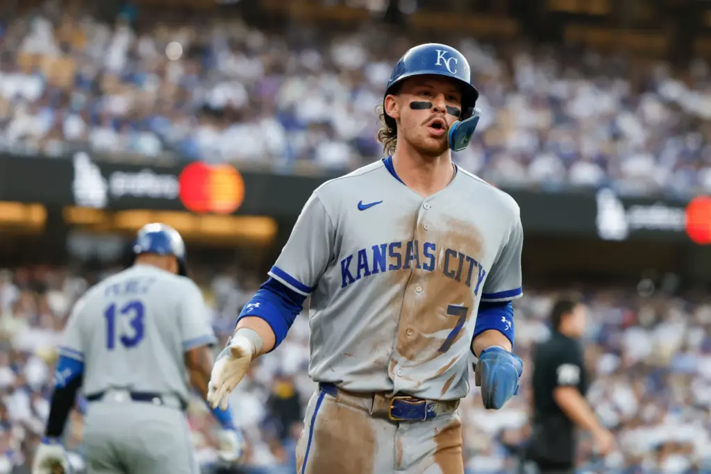 The Kansas City Royals’ Bobby Witt Jr. runs past home...