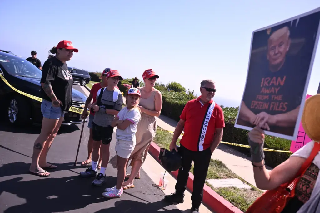 Pro-Trump supporters in front of Trump National Golf Club in...