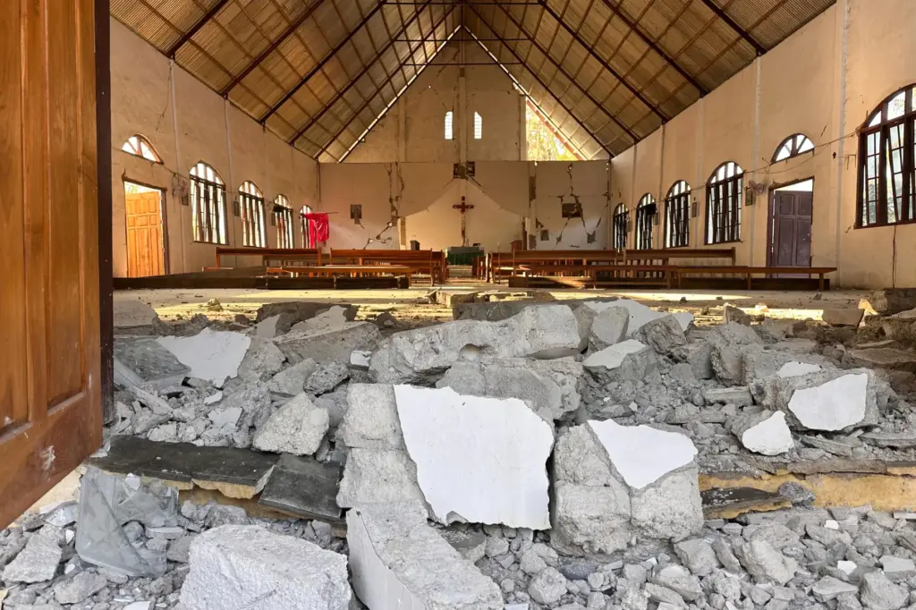 Rubble is seen at the entrance of an earthquake-damaged church in Satar Punda, Indonesia.