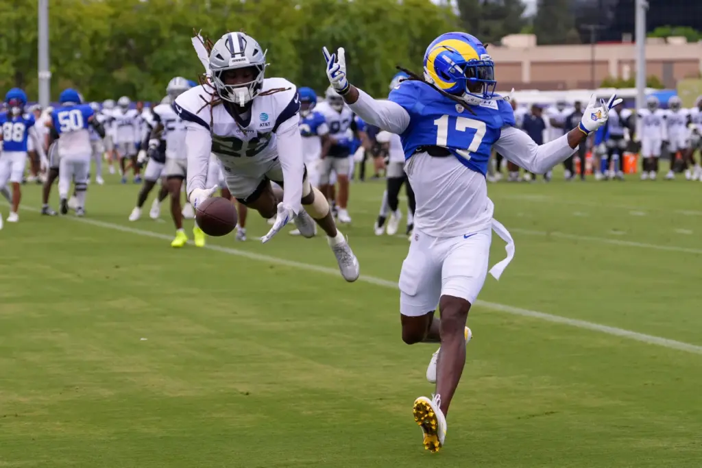 Dallas Cowboys cornerback Shavon Revel Jr., left, breaks up a...