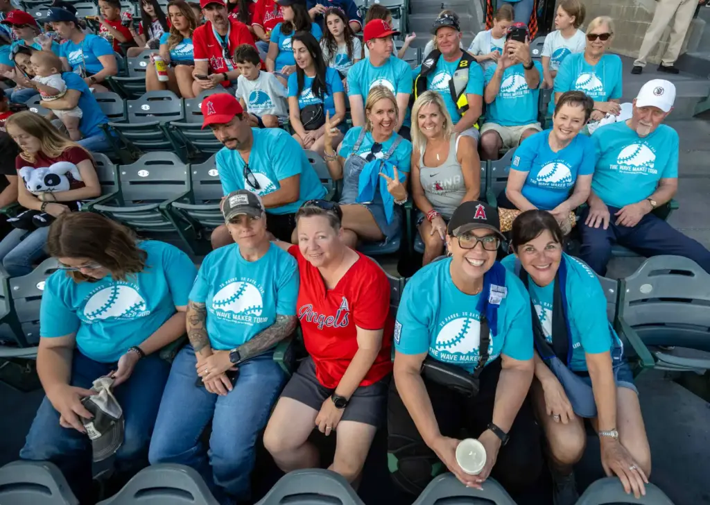 Jasper Ray Foundation supporters sit together in right field at...
