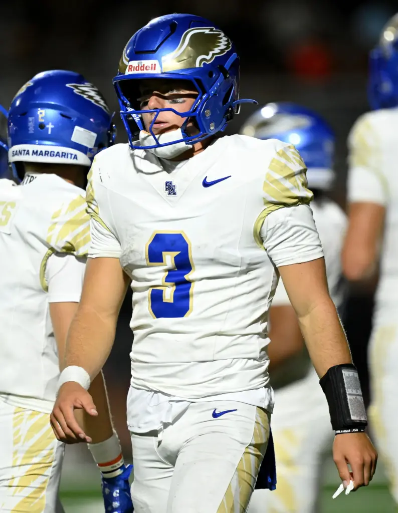 Santa Margarita quarterback Fletch Palmer (3) walks to the sideline...