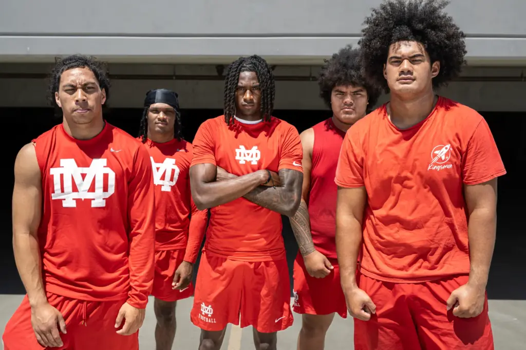 Mater Dei football players from left: Ezekiel Suâa, DJ Clanton,...