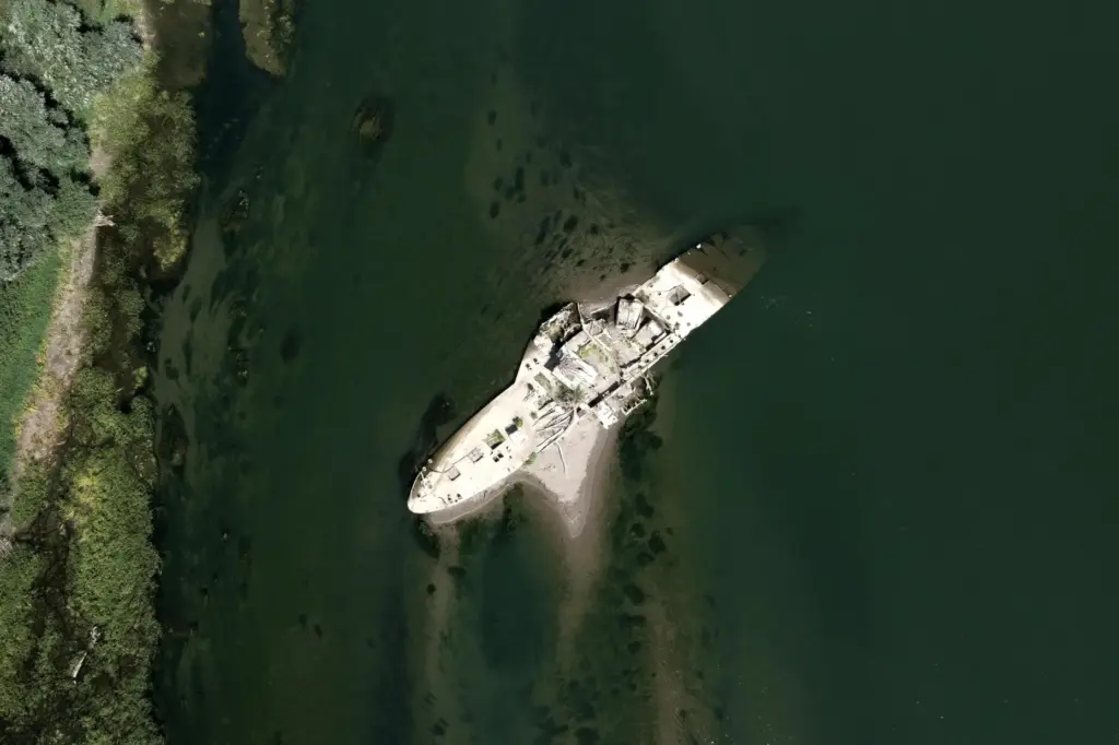 The wreckage of an old steam boat, known as the...