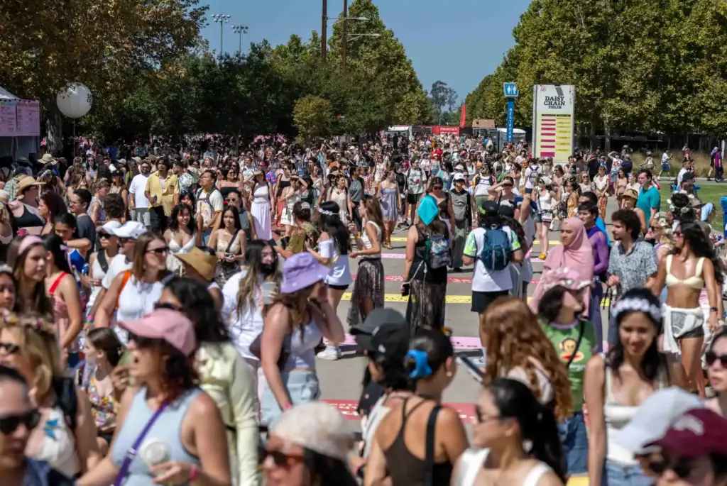 Thousands of festival goers arrive at the Great Park for...
