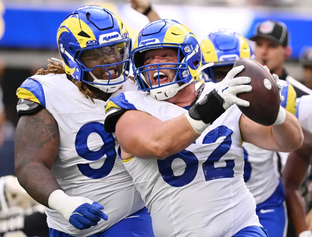 Rams defensive lineman Payton Zdroik (62) reacts after recovering a...