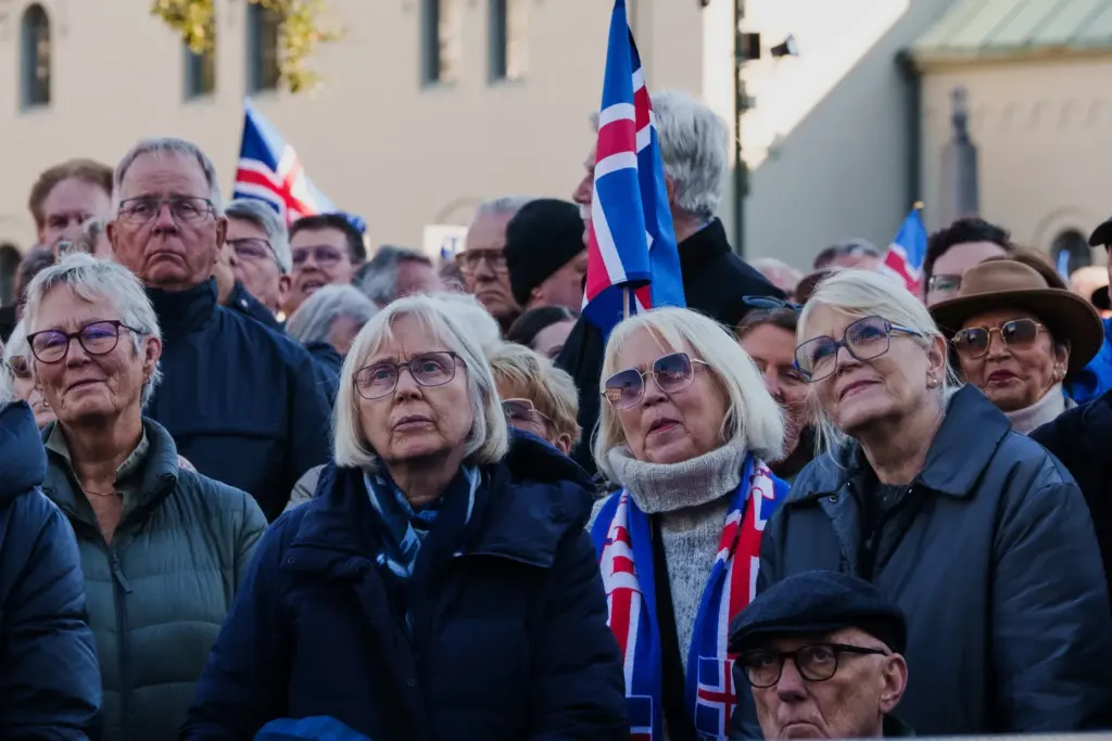 People listen to speakers at an “Afram Island,” “Forward, Iceland”...