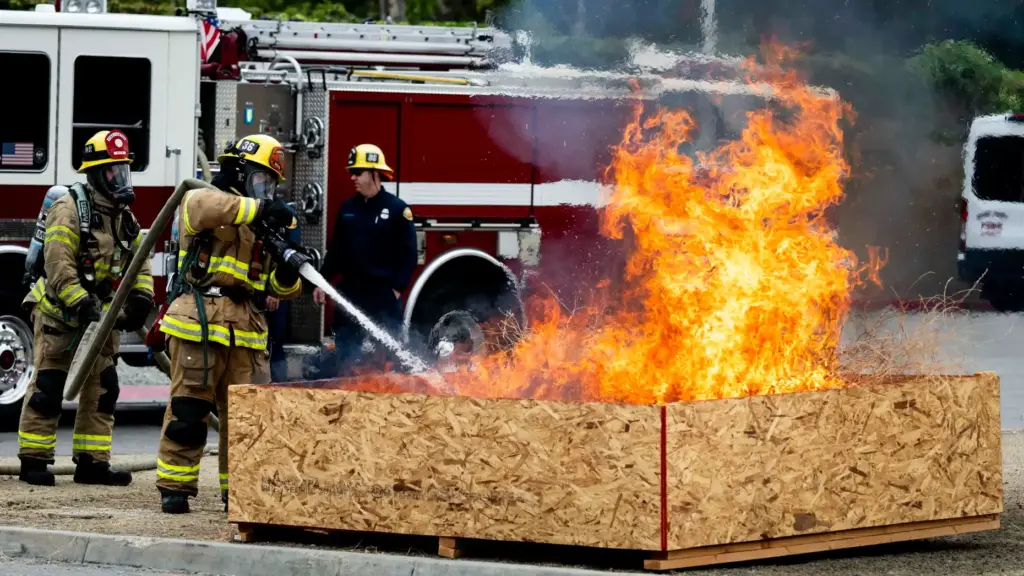 Orange County Fire Authority personnel put out a fire after...