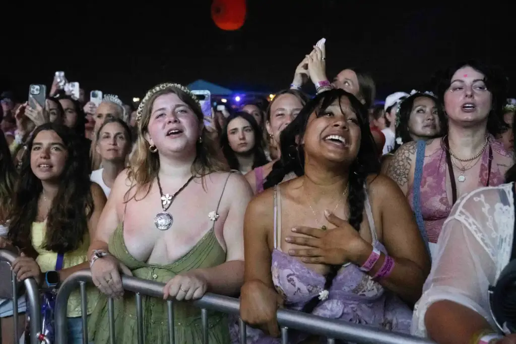 Fans of Olivia Rodrigo sing-a-long during her headlining performance at...