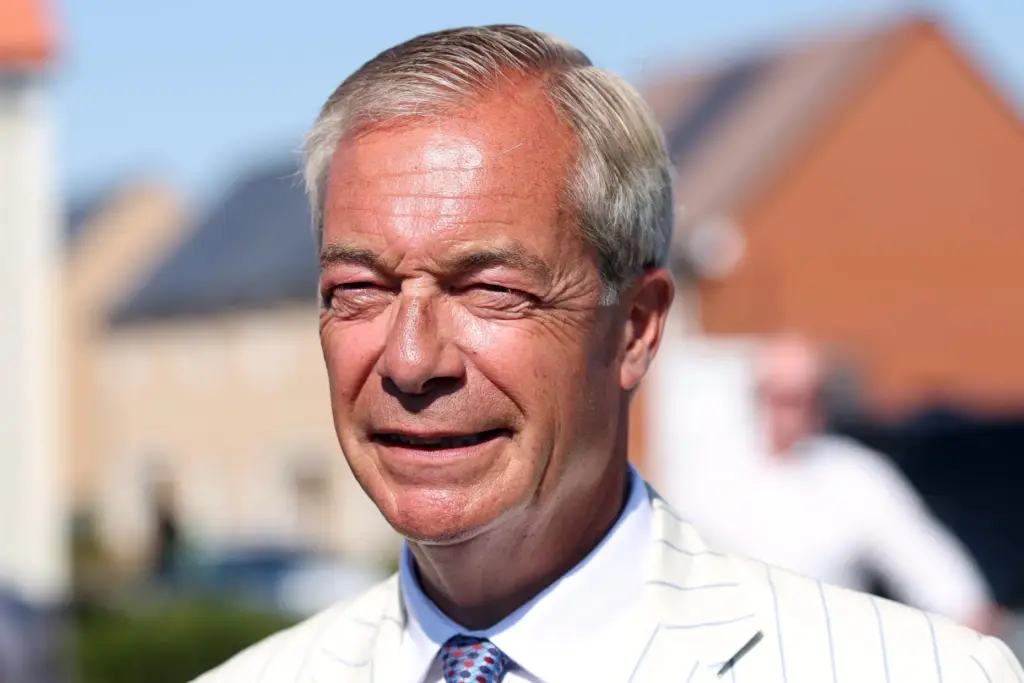 Britain’s Reform UK party leader Nigel Farage arrives at a...