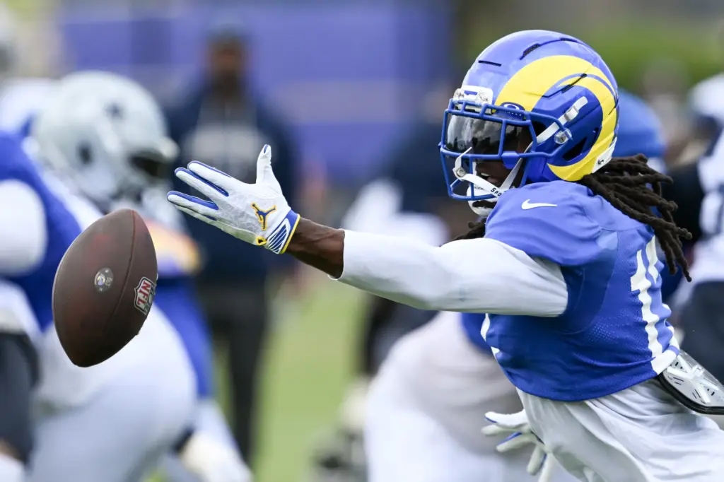 Rams wide receiver Davante Adams can’t reach this pass during...