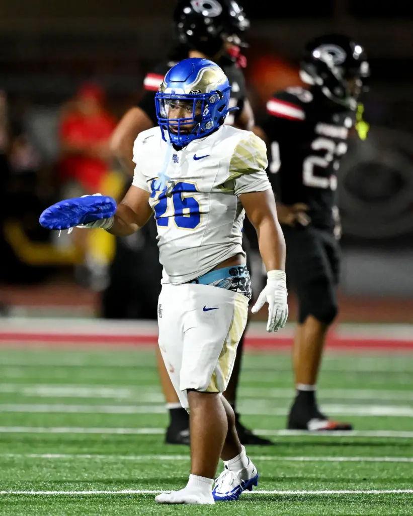 Santa Margarita running back Adrian Petero (26) lost his shoe...