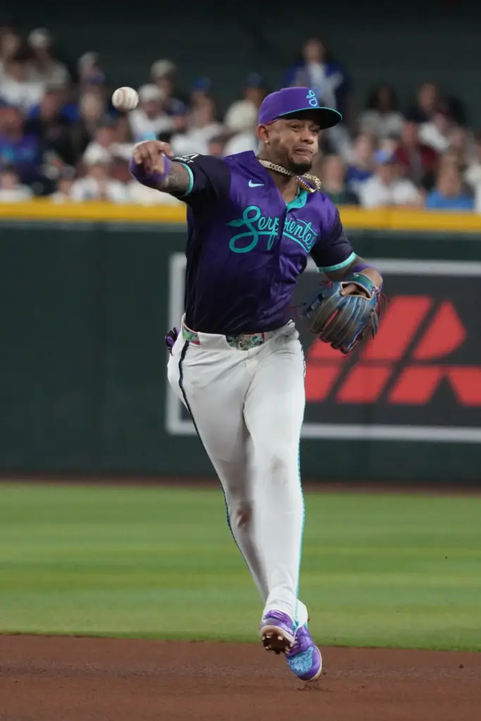 Arizona Diamondbacks second baseman Ketel Marte throws to first during...