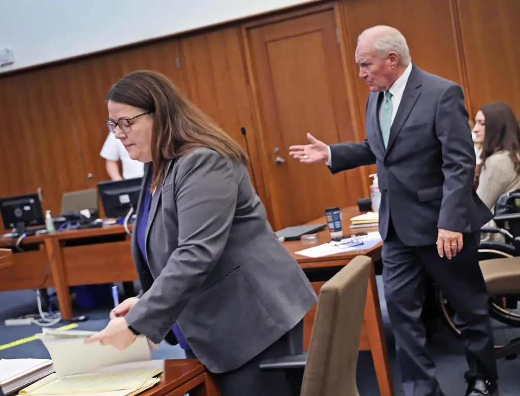 Prosecutor Jennifer Sprague rests her case as defense attorney Kevin Reddington gets in one last question.