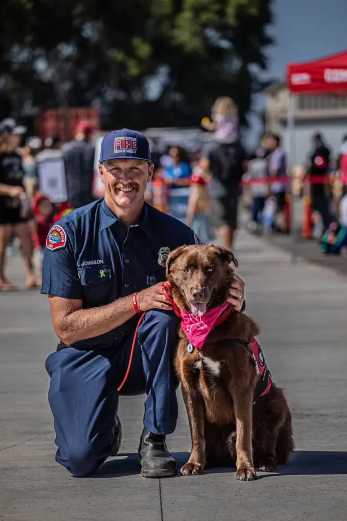 Kingman, a CISK dog at Huntington Beach Fire Department and...