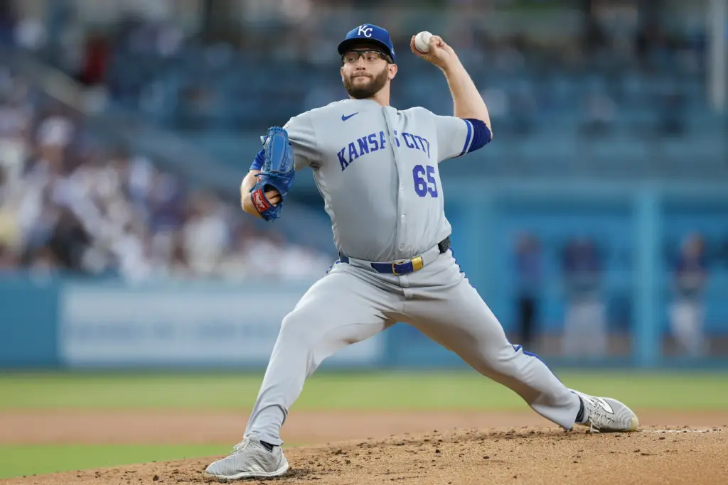Kansas City Royals starting pitcher Noah Cameron throws to the...