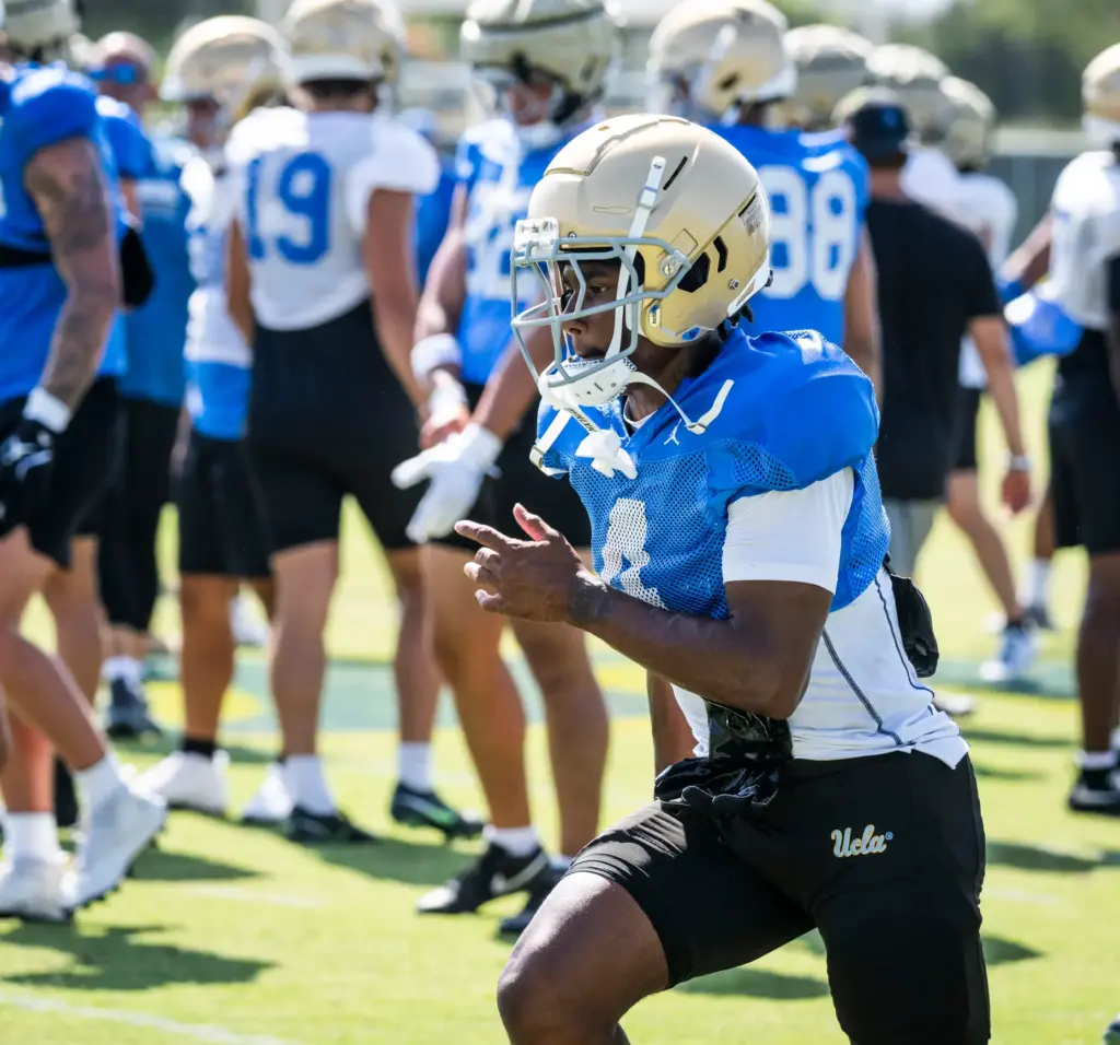 UCLA wide receiver Semaj Morgan goes through drills during the...