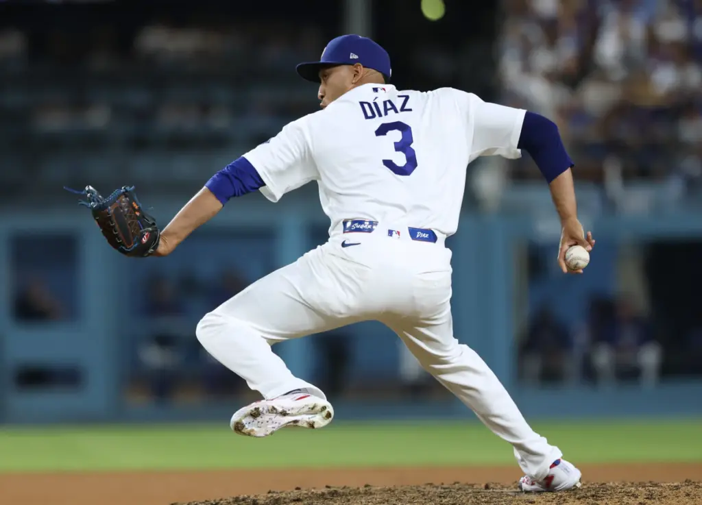 Dodgers relief pitcher Edwin Diaz throws to the plate during...