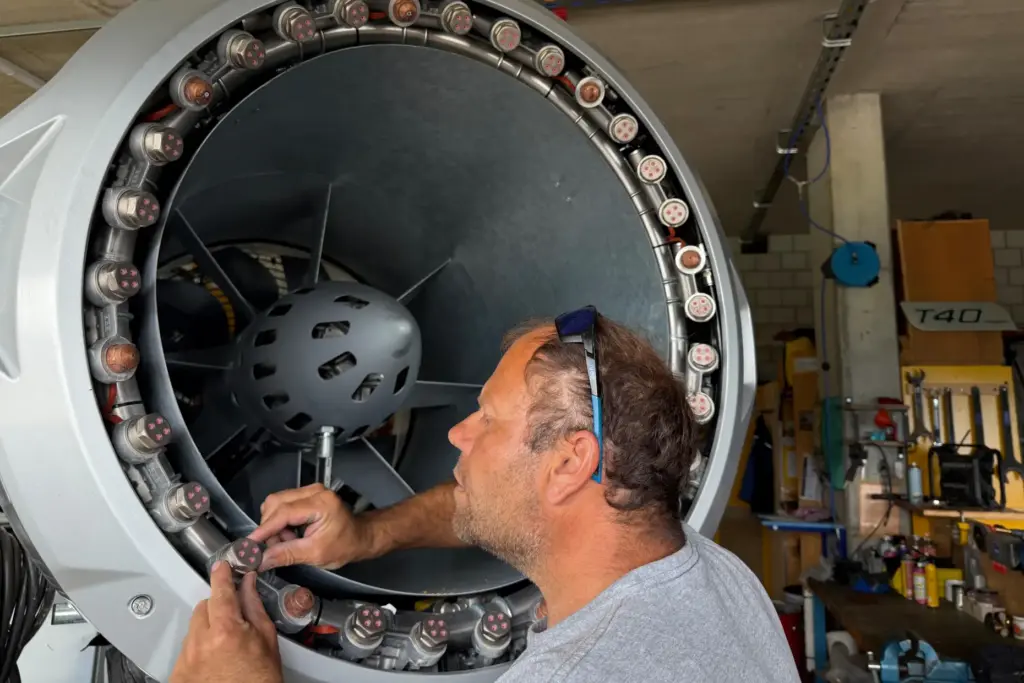 Juerg Klopfenstein, responsible for snowmaking operations at Adelboden-Lenk, inspects a...