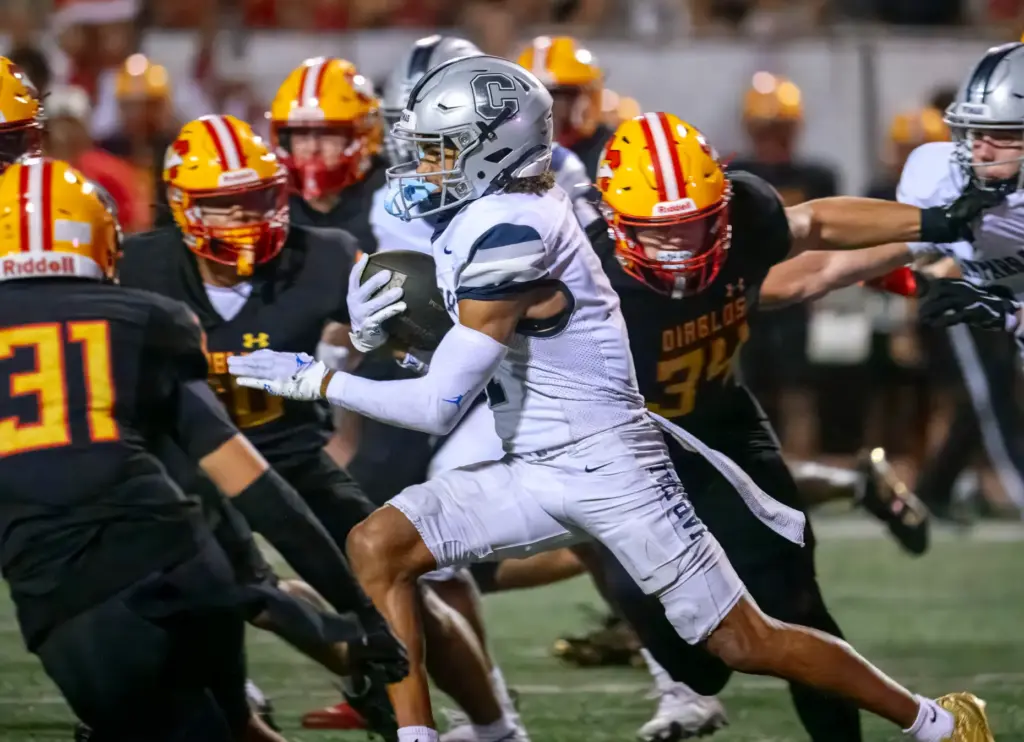 Chaparral wide receiver Michael Kiko Farinas runs through the Mission...