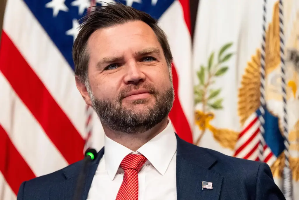 Vice President JD Vance smiles during a roundtable event in...