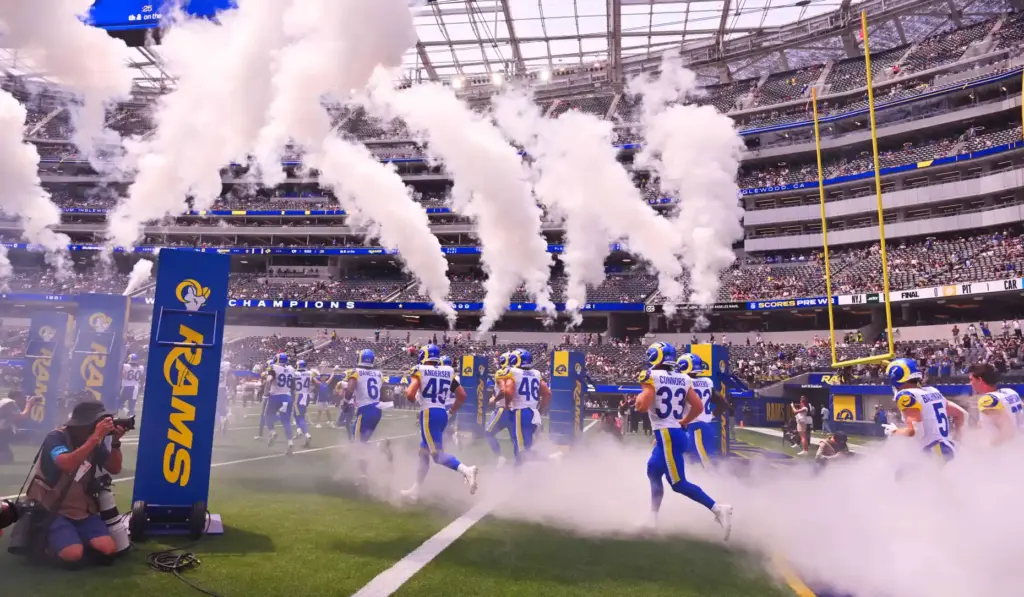 The Rams enter the field prior to an NFL preseason...