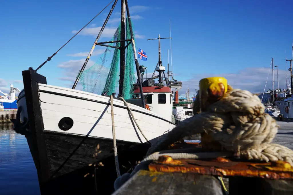 A fishing boat moored at Reykjavik Harbor in Reykjavik, Iceland,...