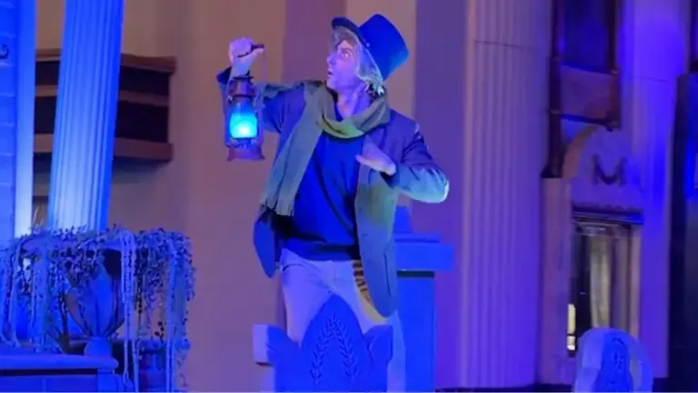 The cemetery caretaker in Madame Leotaâs Swinging Wake street party...