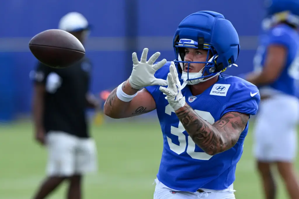Rams tight end Dan Villari catches a pass during the...