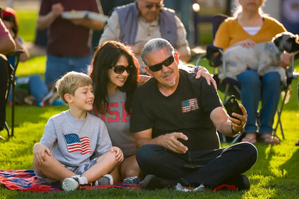 Matthew Carlson, 8, left, and his grandparents Dana and Rick...