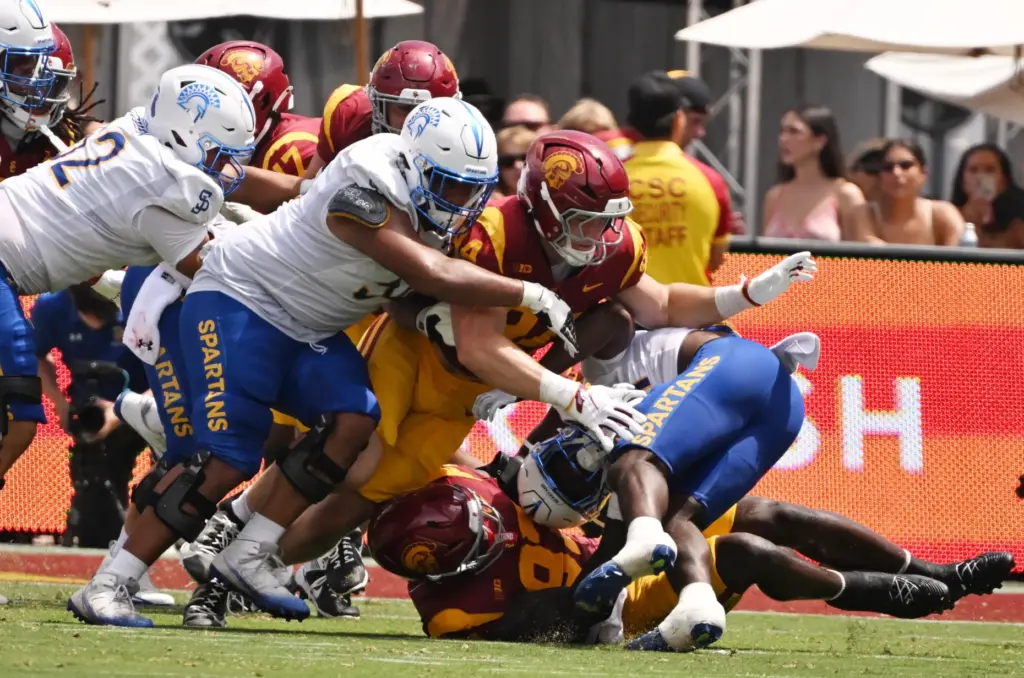 Defensive tackle Jide Abasiri (97) of the USC Trojans tackles...