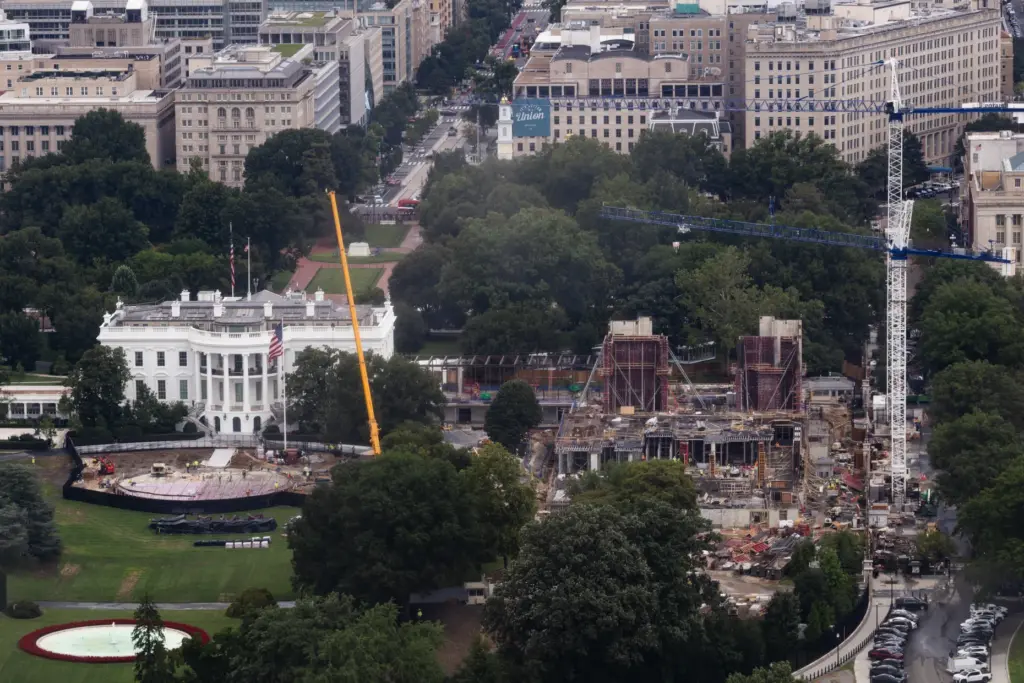 Construction continues on a helipad and the White House ballroom.