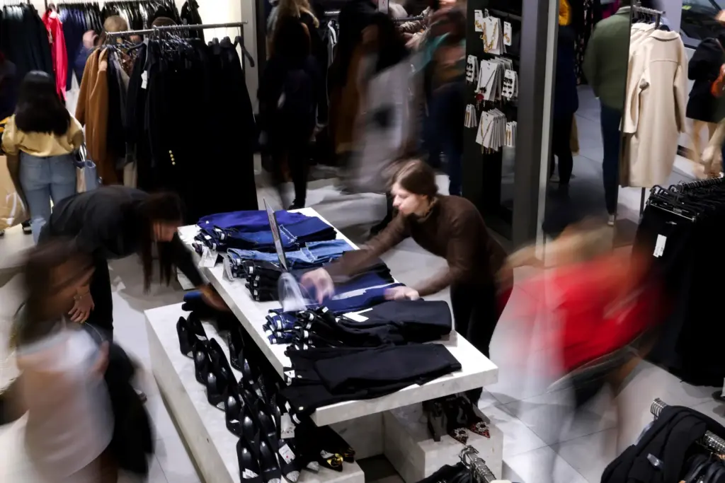 FILE – A display of clothes is organized at a...