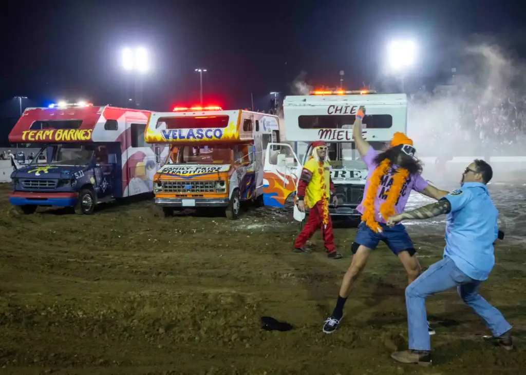Firefighters and police officers from around Orange County help their...