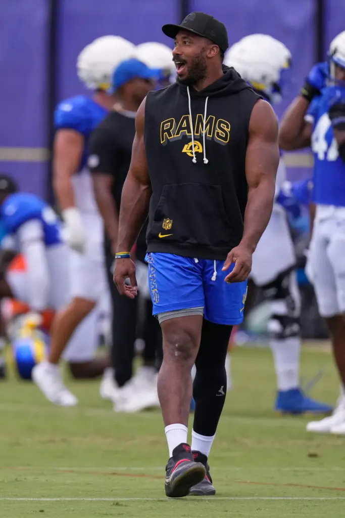 Rams defensive end Myles Garrett walks the field during a...