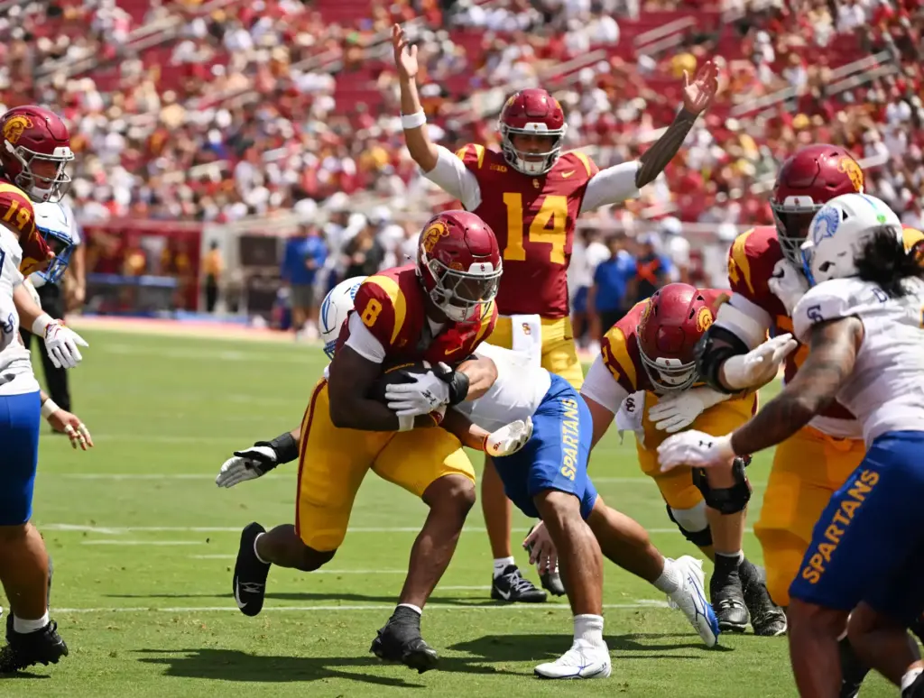 USC running back King Miller runs for a second-quarter touchdown...