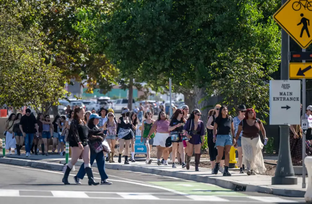 Festivalgoers arrive at the Great Park in Irvine for the...