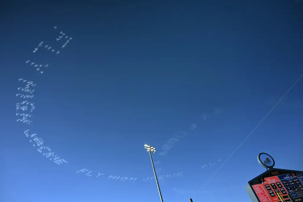 Aerial messages reading “Fly High Jackie” were written in the...
