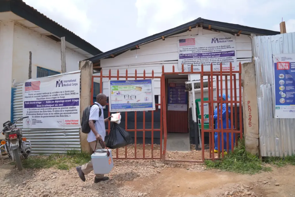 A man arrives at the Ebola treatment center in Bunia General Hospital.