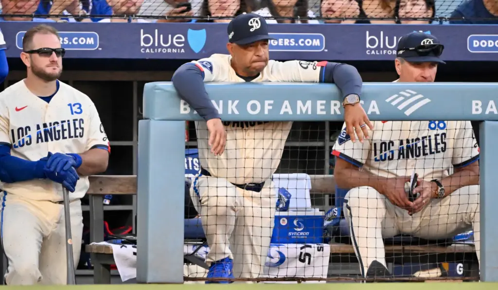 Manager Dave Roberts of the Dodgers looks on against the...