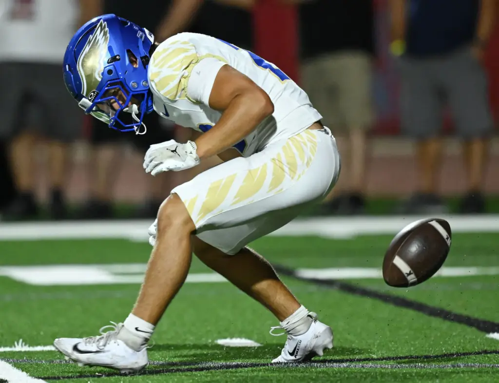 Santa Margarita running back Luca Amaya (23) fumbles the kickoff...